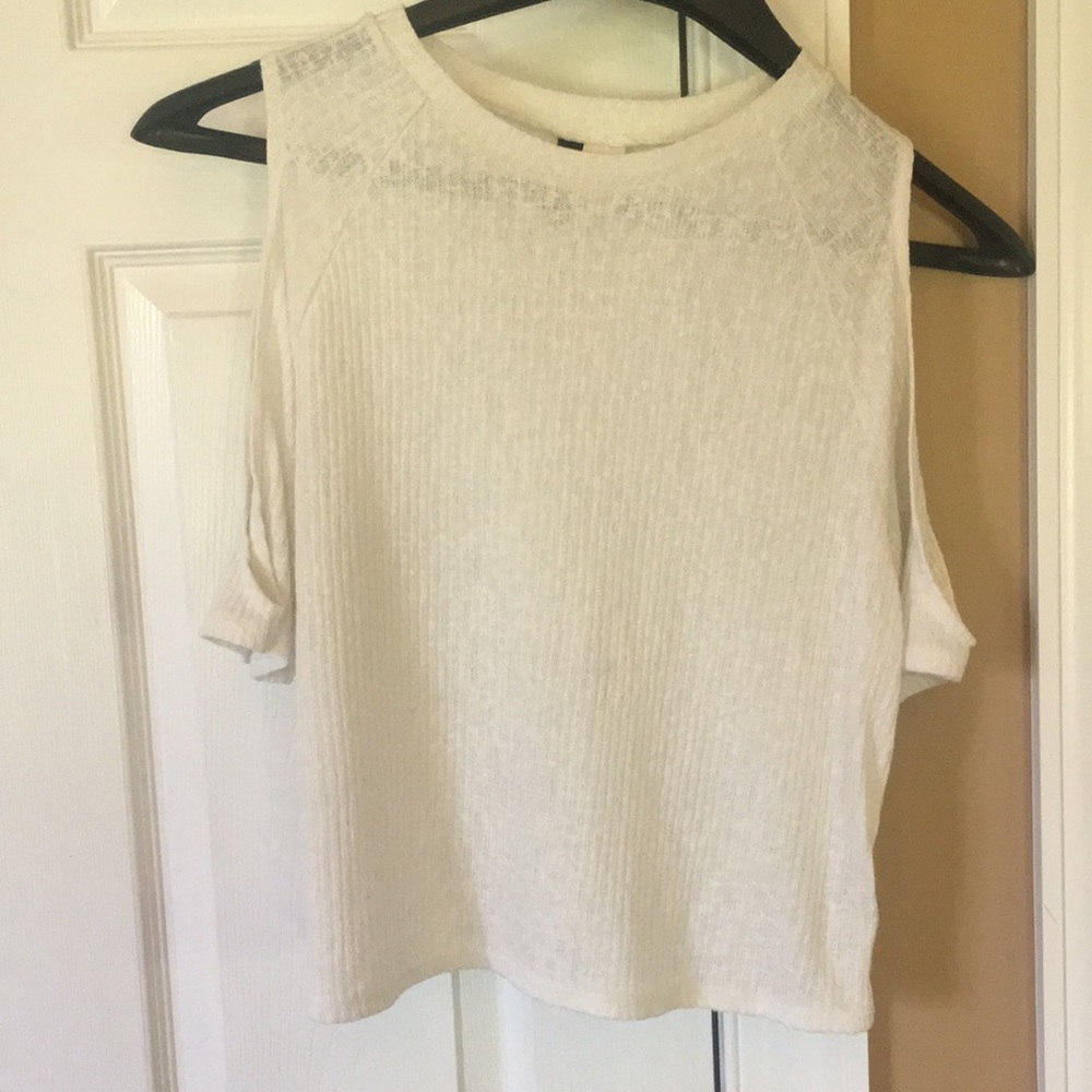 White, slightly shear, open shoulder top